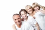 Affectionate Family With Children In Row Stock Photo
