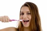 Woman Brushing Her Teeth Stock Photo