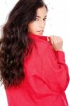 Black Hair Woman In A Red Shirt Stock Photo