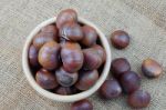 Chestnuts On Sackcloth Stock Photo