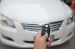 A Hand Press Button Of Remote Control Car Key To Opens A Car Doo Stock Photo