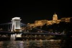 Chain Bridge Illuminated At Night In Budapest Stock Photo