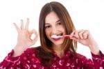 Women Brushing Her Teeth Stock Photo