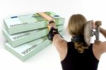 Person Indicating The Bundles Of Euro Note With Skateboard Stock Photo