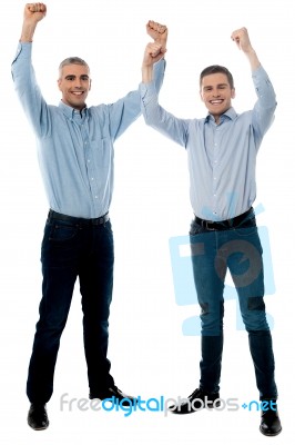 Casual Young Men Winning And Celebrating Stock Photo
