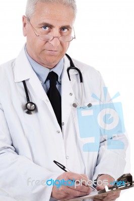 Doctor Making His Notes Stock Photo