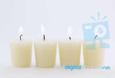 Four Candles Stock Photo