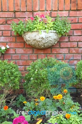 Garden and brick wall Stock Photo - Royalty Free Image ID 10084798