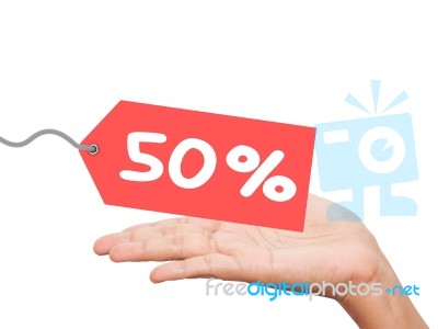 Holding A Red Card With A 50% Discount On Background Stock Image