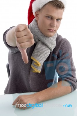Man Wearing Hat Showing Thumb Down Stock Photo