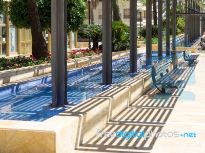 Marbella, Andalucia/spain - May 4 : Blue Pool At Avienda Del Mar… Stock Photo
