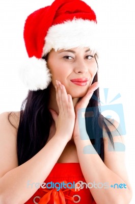 Young Girl Wearing Christmas Hat Stock Photo