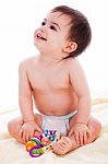 Baby Sitting With Toys And Smile Stock Photo