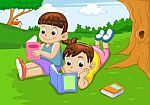 Boy And Girl Reading Stock Photo