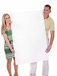Couple With Blank White Board Stock Photo