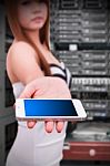 Programmer And Smart Phone In Data Center Room Stock Photo