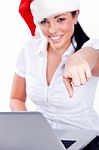 Santa Woman Pointing With Laptop Stock Photo