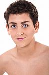 Shirtless Young Boy Smiling Stock Photo