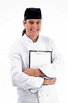 Smiling Male chef with clipboard Stock Photo