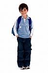 Young School Boy Smiling And Looking Away Stock Photo