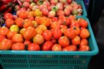 Baskets Of Tomatoes For Sale Stock Photo