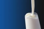 White Milk In Glass Stock Photo