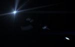 Abstract Digital Sun Light And Lens Flare In Black Background Stock Photo