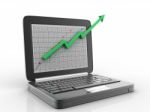 Laptop With Business Graph Stock Photo