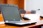 Laptop In Meeting Room Stock Photo