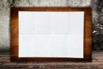 Blank White Paper Texture On The Wood Wall Stock Photo