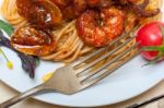 Italian Seafood Spaghetti Pasta On Red Tomato Sauce Stock Photo