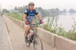 Cyclist Crossing Lake Called Lago De Amatitlan In Villa Canales, Stock Photo