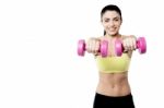 Happy Woman Lifting Dumbbells Stock Photo