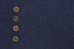 Dark Blue Jeans Texture With Metal Buttons Stock Photo