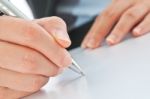 Hand Holding Pen Stock Photo