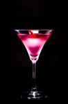 Cosmopolitan Cocktail With Rose In Top Of A Black Background Stock Photo