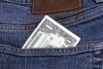 Dollar In Pocket Stock Photo