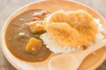 Curry Rice With Fried Pork Stock Photo