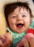 Happy Baby In Carseat Stock Photo