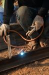 Worker Welding Steel Stock Photo