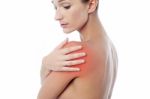 Young Woman Having Shoulder Pain Stock Photo