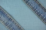 Jeans With Stitch On Blue Dot Cloth Background Stock Photo