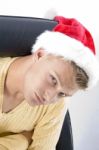 Close Up Of Male In Christmas Hat Stock Photo