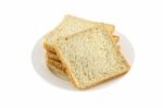 Front Pile Of Wheat Slice Bread Dish On White Background Stock Photo