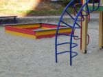 Children Playground, Swing Near The House  Stock Photo