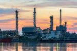 Oil Refinery At Twilight In Bangkok, Thailand Stock Photo