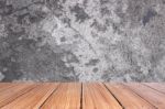 Top Of Wood Table On Old Concrete Wall Background Stock Photo