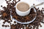 Coffee Cup With Spreaded Beans Stock Photo