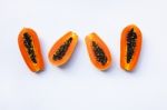 Papaya On White. Copy Space Stock Photo