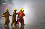 Fireman. Firefighters Fighting Fire During Training Stock Photo